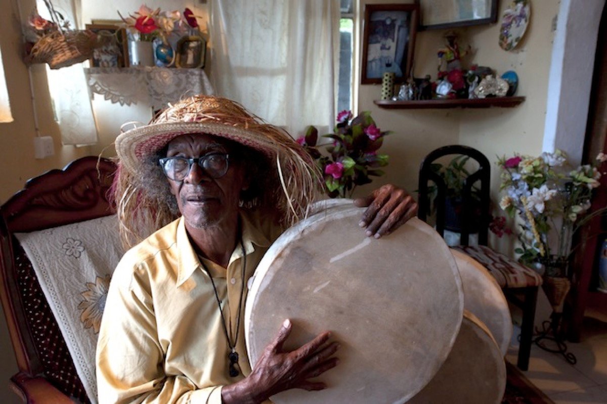 michel legris at home holding two ravann drums